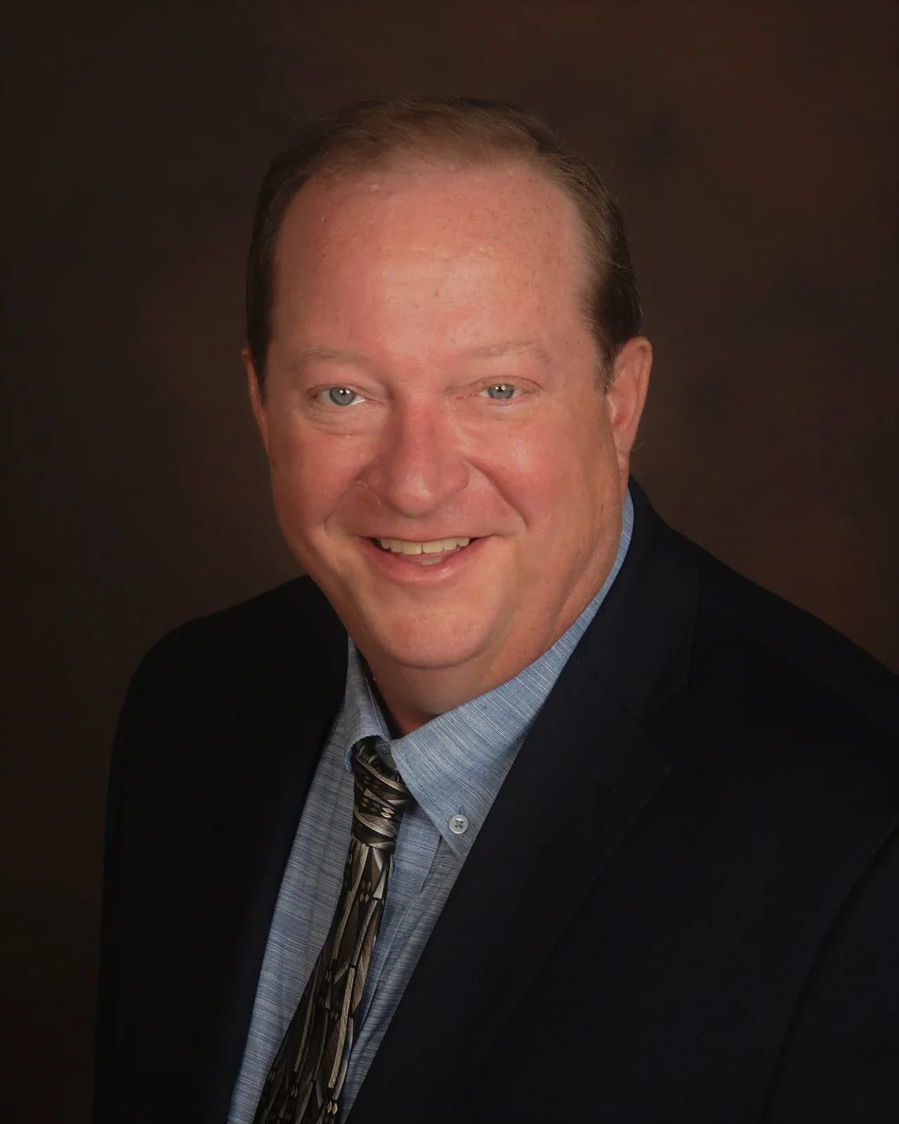 Professional portrait of Jim McElroy