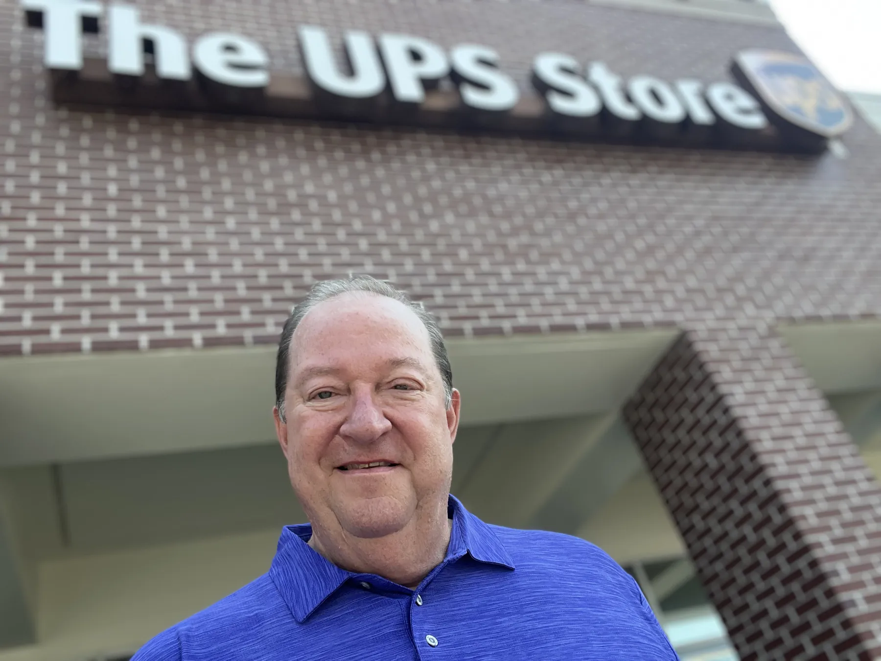 Jim McElroy outside a location of The UPS Store