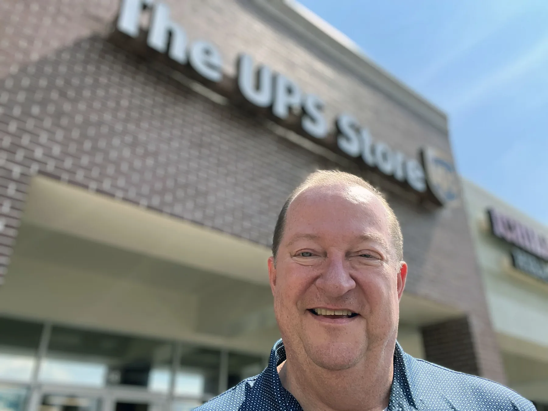 Jim McElroy in front of The UPS Store