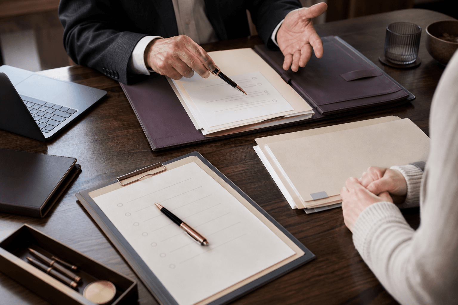 Advisor guiding a prospective owner through approval documents